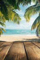 Relaxing view of a sandy beach framed by palm leaves under a bright sky photo