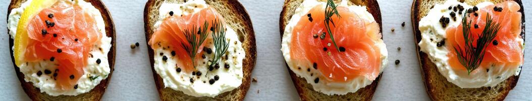 Delicious smoked salmon open-faced sandwiches with cream cheese and herbs photo