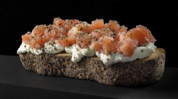 Delightful rye bread topped with fresh salmon and creamy spread photo