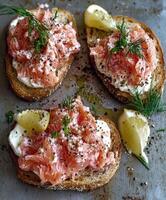 Delicious open-faced sandwiches with smoked salmon and fresh toppings photo