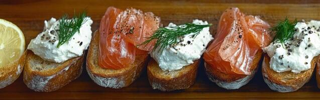 Delicious smoked salmon bruschetta with creamy cheese and fresh herbs photo