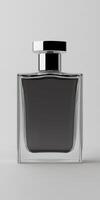 Elegant black perfume bottle with silver accent on a neutral background photo
