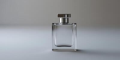 Elegant clear glass perfume bottle on a minimalist background photo