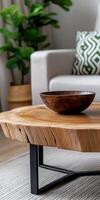 Coffee table with wooden bowl in a modern living room setting photo