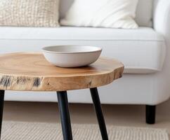 Rustic wooden table with minimalist decor in a modern living room setting photo
