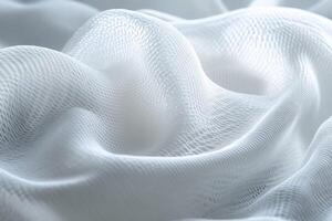 Soft white fabric drapes in gentle waves under soft light in a serene setting photo