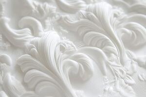 Elegant white textured fabric with intricate floral patterns and designs photo