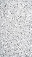 Textured white wall with detailed pattern showcasing unique design elements photo