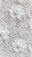 Delicate white lace fabric with floral design captured in natural light photo