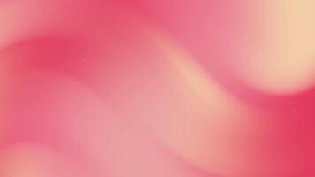 Pink and peach gradient background has tiny white specks. video