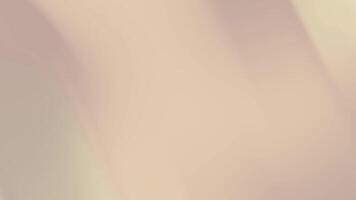 Pale beige gradient background features subtle light diagonal shading. video