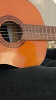 Street Composer Writes His First Song In A Park With Classical Guitar video