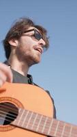 Carefree Man Plays Classical Guitar On A Sunny Day video