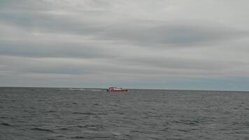 Patrol police ship, with border guards on board, overtakes and attempts to stop boat carrying intruders, or poachers, in middle of freezing Arctic Ocean. video