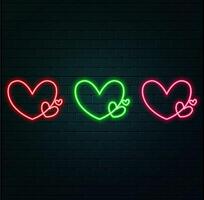 Neon heart frames, gradient glowing borders set, vibrant geometric shapes, modern signs collection. Colorful futuristic Valentines Day design elements. illustration... vector