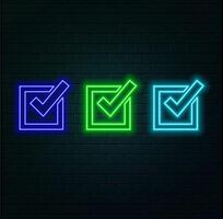 Neon glowing check mark sign on a black background... vector