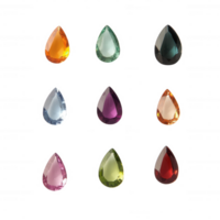 Colorful gemstones arranged in a grid showcasing various hues and shapes. png
