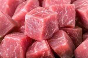 Pieces of raw pork meat as a background. Selective focus. photo