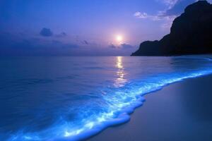 Glowing surf is a natural phenomenon that occurs when the surface layers of the sea or ocean are filled with microorganisms capable of bioluminescence. photo