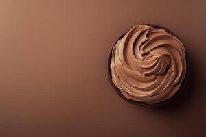 Top view of mocha or chocolate mousse dessert with smooth texture, soft brown background. Color trend concept, color of the year 2025. Banner with copy space. photo