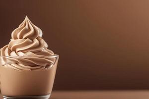 Side view of mocha or chocolate mousse dessert with smooth rich texture, soft brown background. Color trend concept, color of the year 2025. Banner with copy space. photo