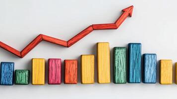 Vibrant wooden blocks are stacked and aligned in a way that highlights an upward trend, symbolizing growth and progress photo