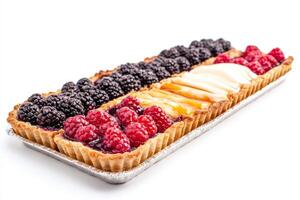 A stunning dessert tray showcases an array of blackberry and raspberry tarts, each crafted with delicate pastry and vibrant fruit. Perfect for any sweet-toothed gathering photo