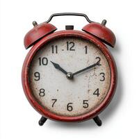 Vintage red alarm clock showing the time photo