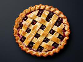 Overhead view of a delicious homemade cherry pie with a lattice crust photo