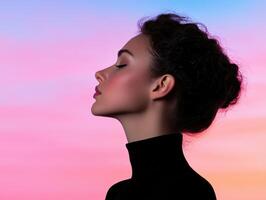 Profile of a woman with closed eyes against a colorful background photo
