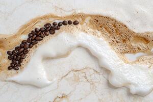 Close up of spilled coffee with coffee beans forming a path photo