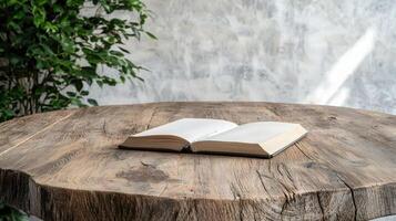 Open book on rustic wooden table photo