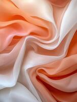 Abstract background of flowing fabric in peach and white shades photo