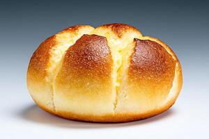 Golden bread roll with a soft texture and crisp surface. photo