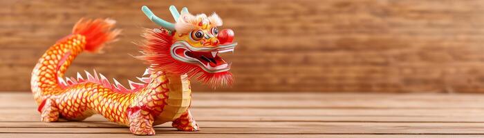 Eco friendly with senior in Chinese new year. Colorful dragon figurine on a wooden surface. photo