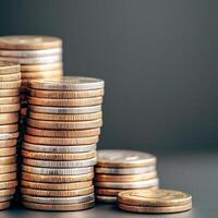 Financial security tips concept. Stacks of coins arranged on a surface, reflecting wealth and finance. photo