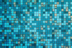 The texture of the blue water ripples in the swimming pool photo