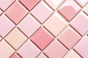 Smooth ceramic tiles in soft pink, dusty rose, and light cream arranged in a geometric pattern contributing to an elegant interior design aesthetic photo