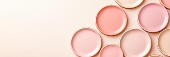 Smooth ceramic tiles in soft pink, dusty rose, and light cream arranged in a geometric pattern ideal for modern interior design and decor photo