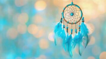 Dreamcatcher adorned with turquoise beads and feathers hanging against a soft bokeh background in a serene atmosphere photo