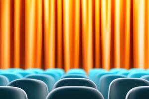 Old theater stage features terracotta curtains and muted gray seats under soft teal lighting, creating an inviting atmosphere for performances photo