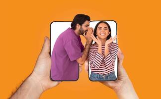 A couple is engaged in a lively chat through their smartphones, showcasing the connection technology brings to relationships despite physical distance. Their expressions reflect love and affection. photo