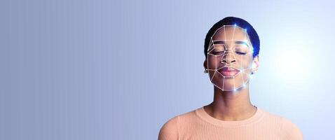 A woman with closed eyes stands against a gradient backdrop. Her face is enhanced by digital mapping technology, illustrating advanced facial recognition capabilities in a modern context. photo