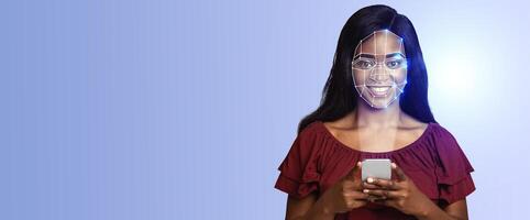 A person with a bright smile is using a smartphone, while facial recognition technology overlays their face. The background is a solid color, enhancing the focus on the individual and the tech. photo