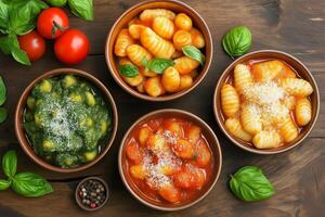 Assorted Gnocchi Bowls with Different Sauces on Rustic Table Flat Lay photo