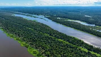Aerial View of Amazonian River at Manaus Amazonas in Brazil . Mato Grosso Global Warming. photo