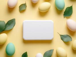 Minimalist Easter layout with colorful eggs and leaves for holiday decor photo
