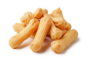 Chewy dog treats shaped like bones arranged on a white background perfect for canine snacks photo