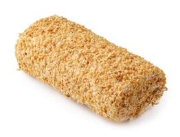Crunchy roll coated in toasted oats found in a food market showcasing a unique snack option photo
