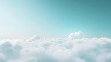 Aerial view of fluffy white clouds filling the frame under a gradient blue sky photo